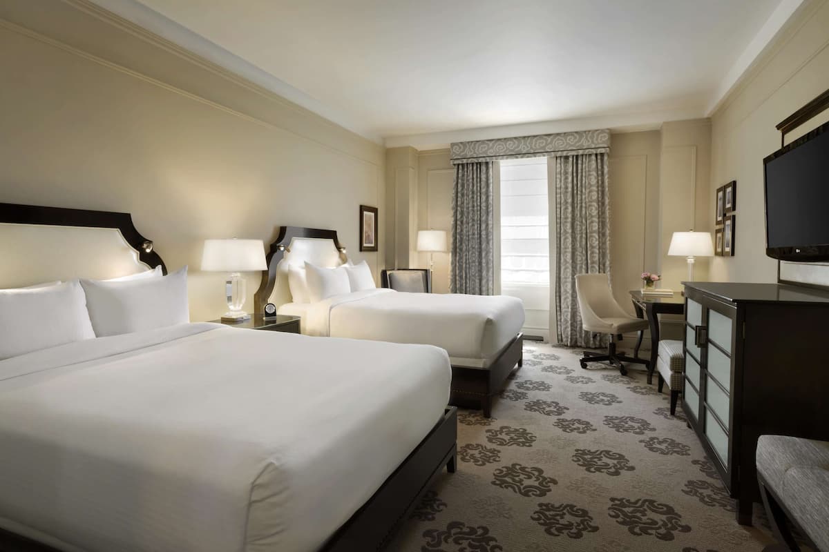 Premium bedding, down comforters, minibar, in-room safe