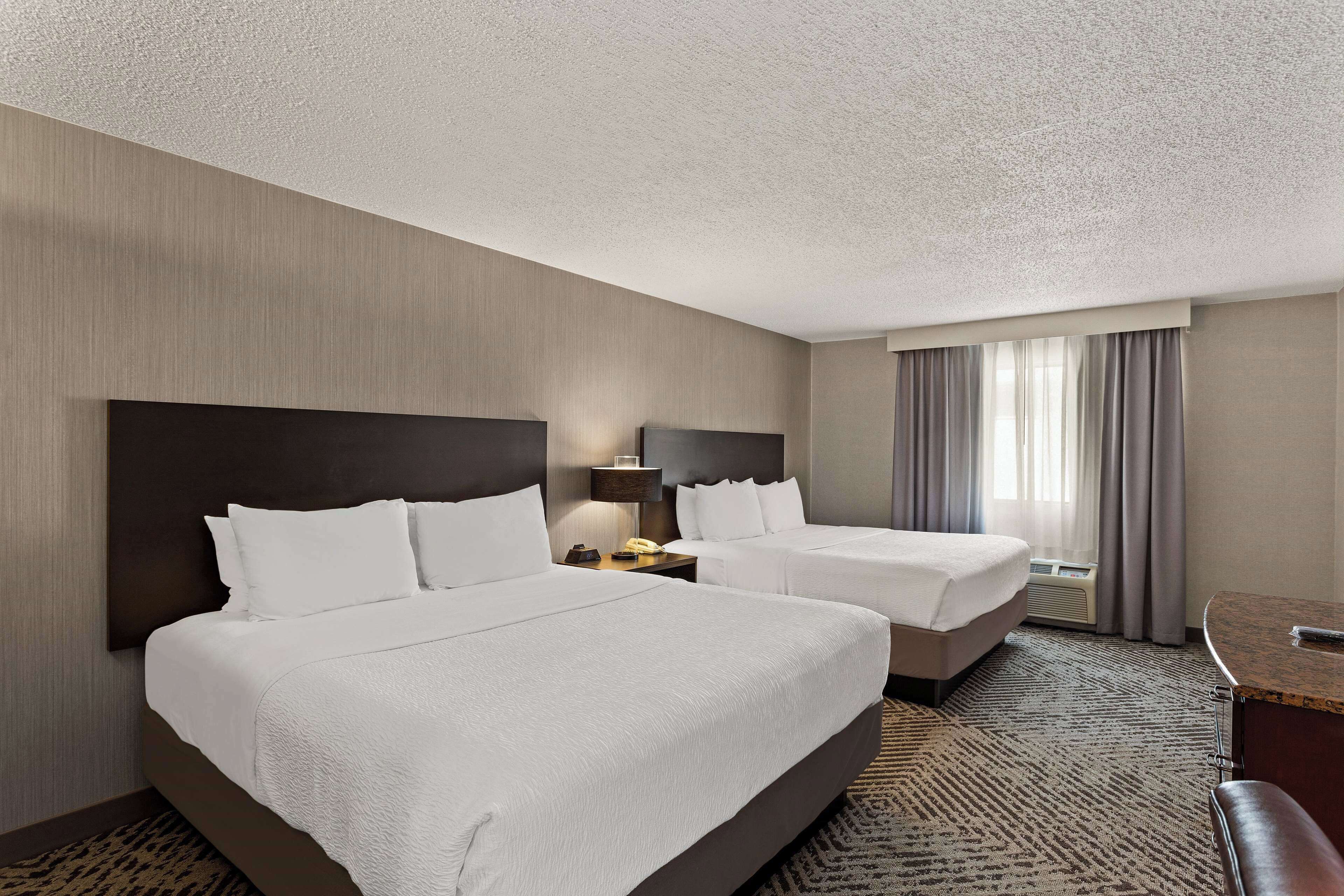 room, multiple beds, non smoking | blackout curtains, iron/ironing board, free wifi, bed sheets