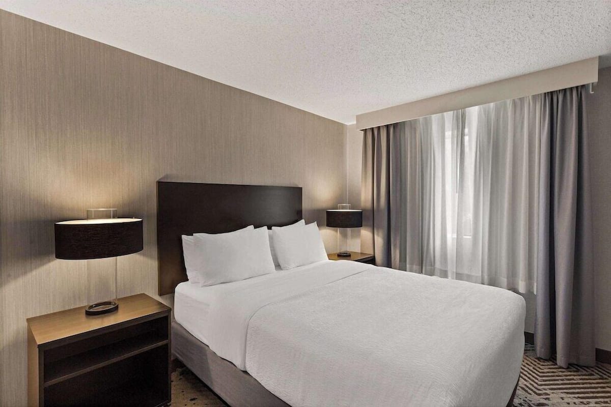 Blackout drapes, iron/ironing board, bed sheets
