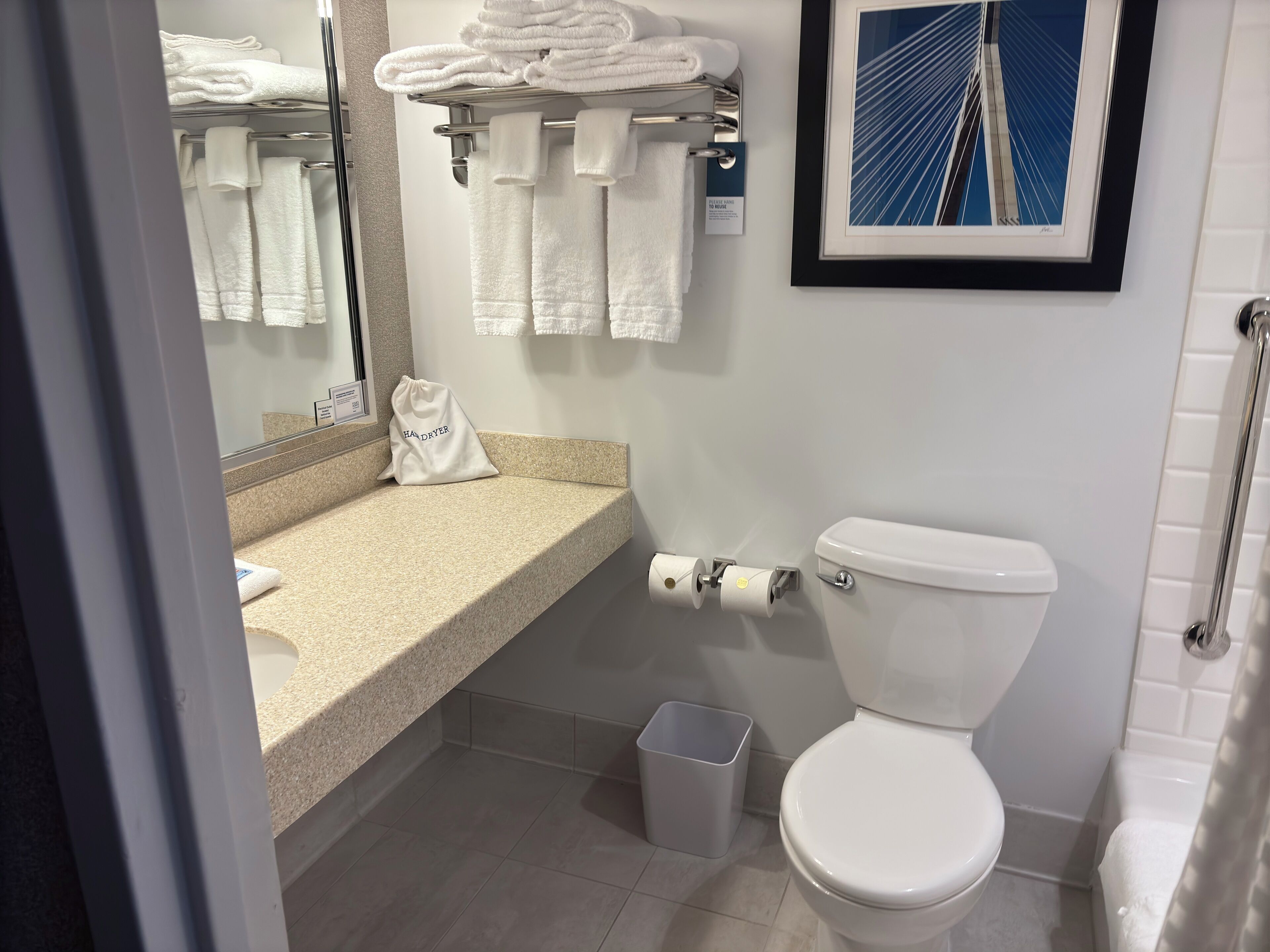 standard room, 1 king bed | bathroom | hair dryer, towels, soap, shampoo