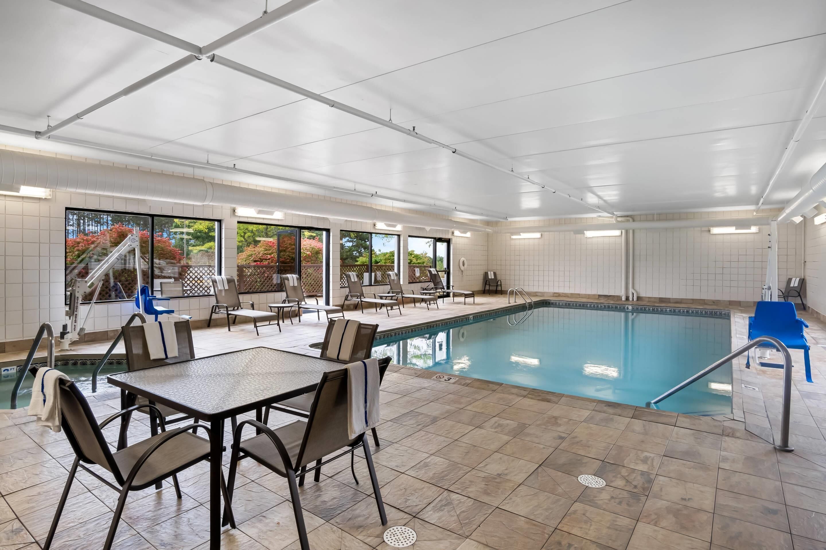 indoor pool, outdoor pool, open 8 am to 11 pm, pool loungers