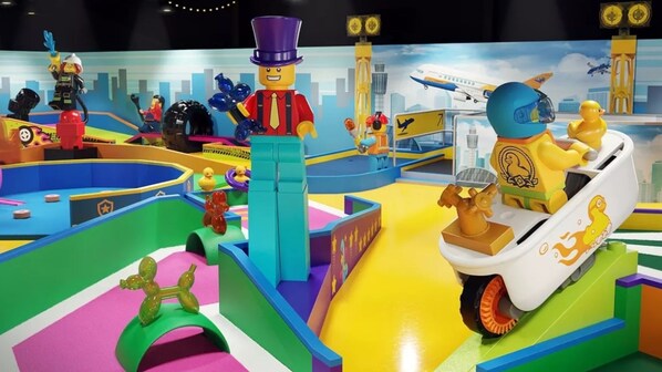 A colorful indoor play area with various toys and structures. - Holiday Inn Slough - Windsor by IHG (Slough)