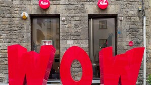 A building with two large glass doors, each marked with a 'Leica' sign. - Gallery Hotel Art - Lungarno Collection (Florence)
