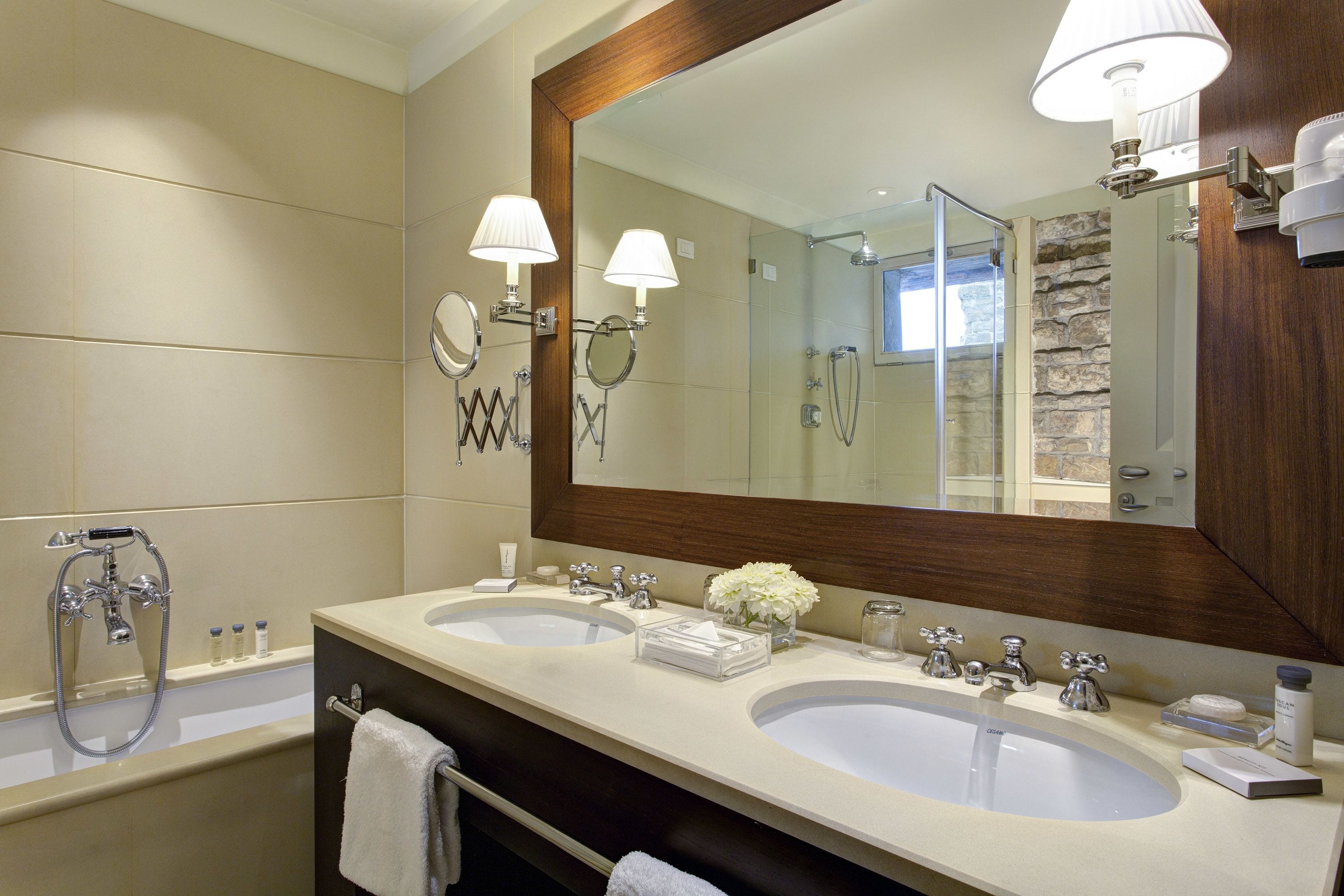 penthouse (suite) | bathroom | combined shower/bathtub, rainfall showerhead, designer toiletries