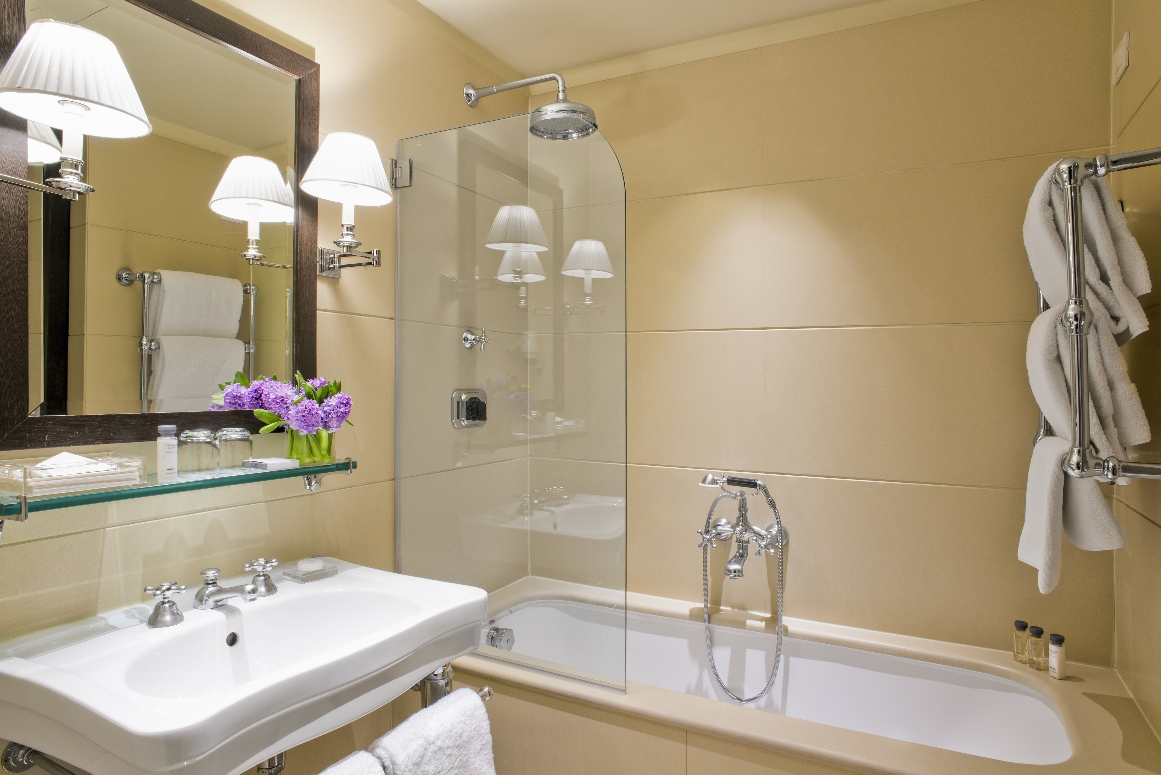 combined shower/bathtub, rainfall showerhead, designer toiletries