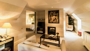 Suite, 1 Bedroom | Living area | 40-inch flat-screen TV with digital channels, TV, DVD player
