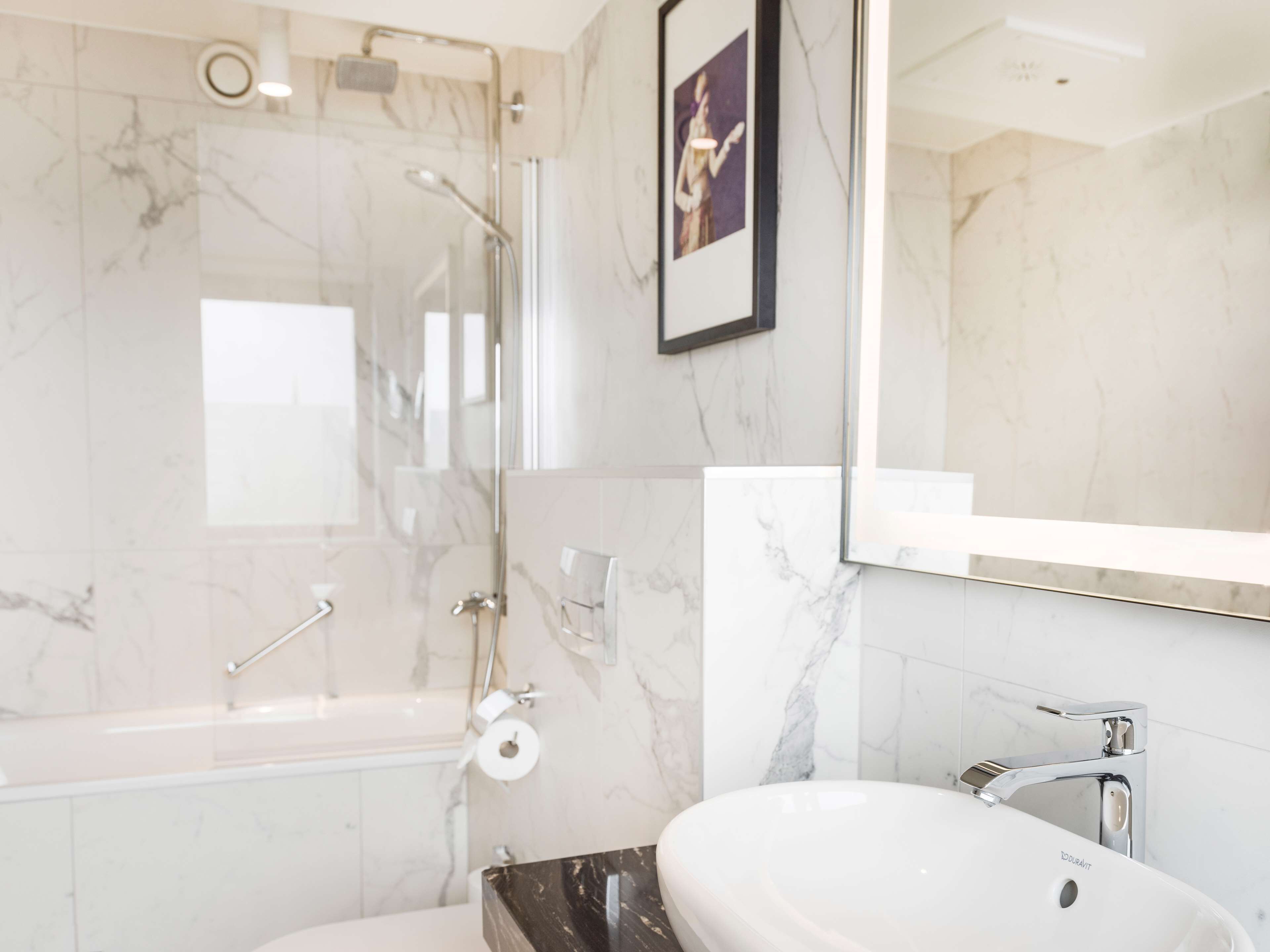 premium room, lake view | bathroom | shower, rainfall showerhead, eco-friendly toiletries, hair dryer