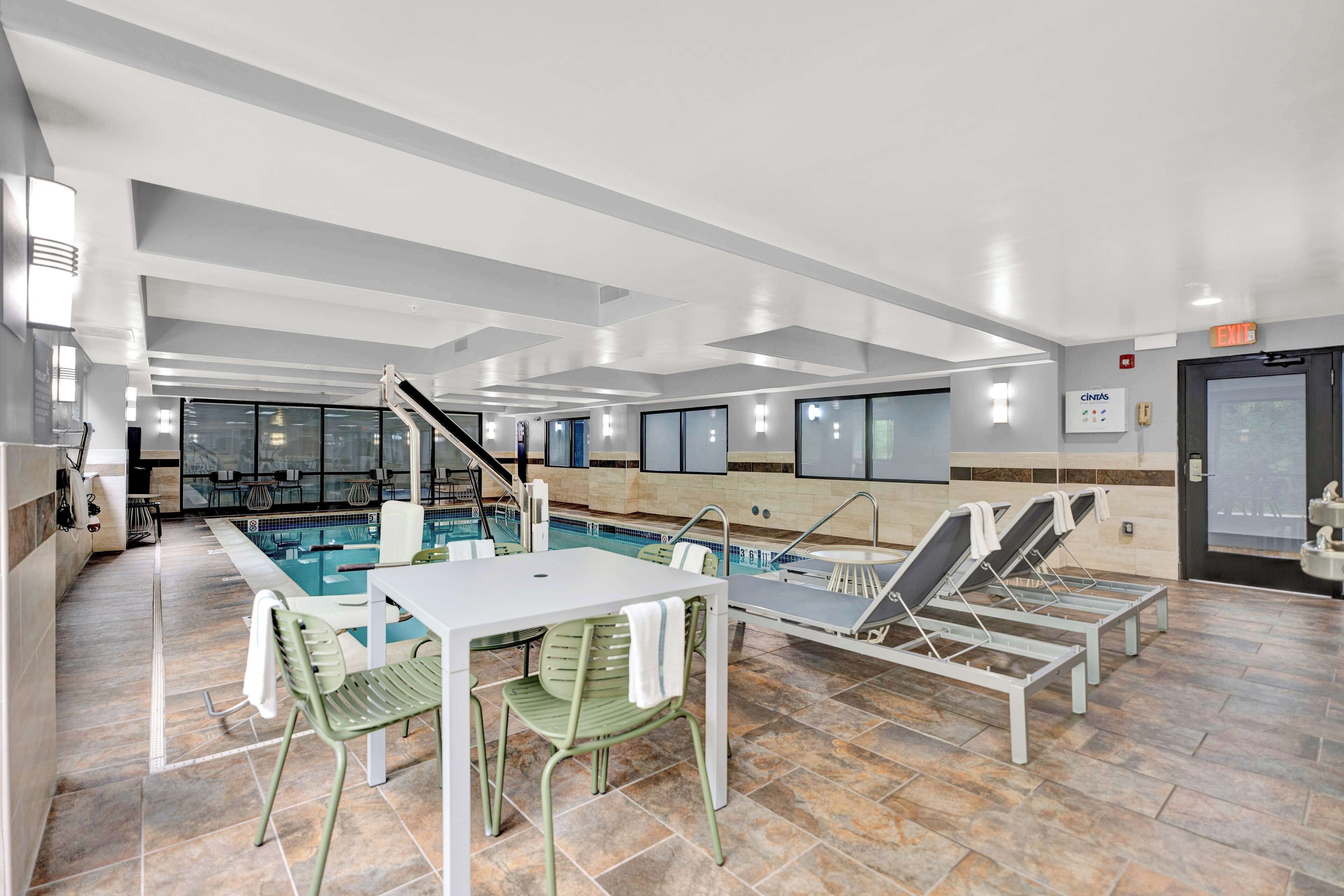 indoor pool, open 7:00 am to 10:00 pm, pool loungers