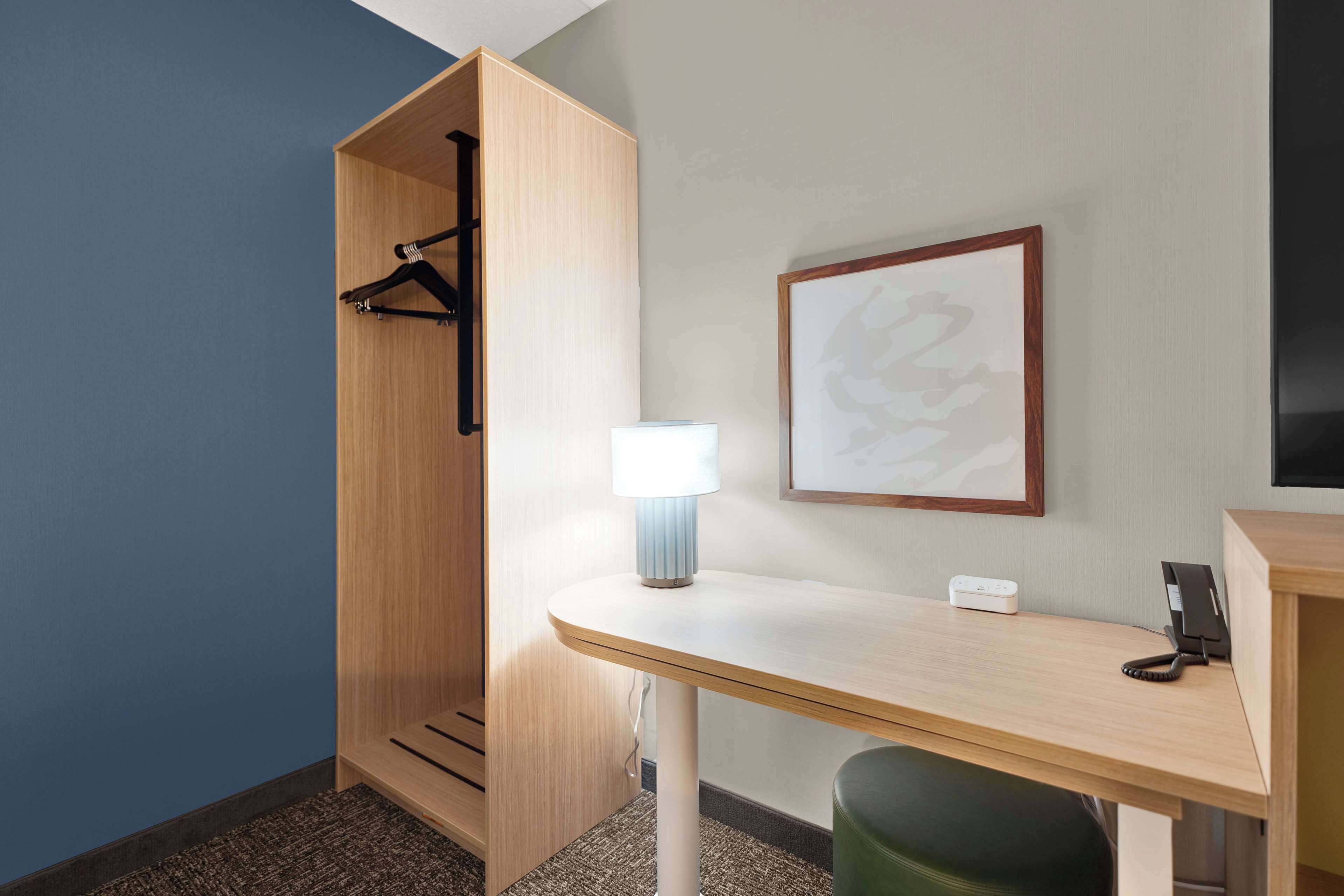 premium bedding, pillow-top beds, desk, laptop workspace