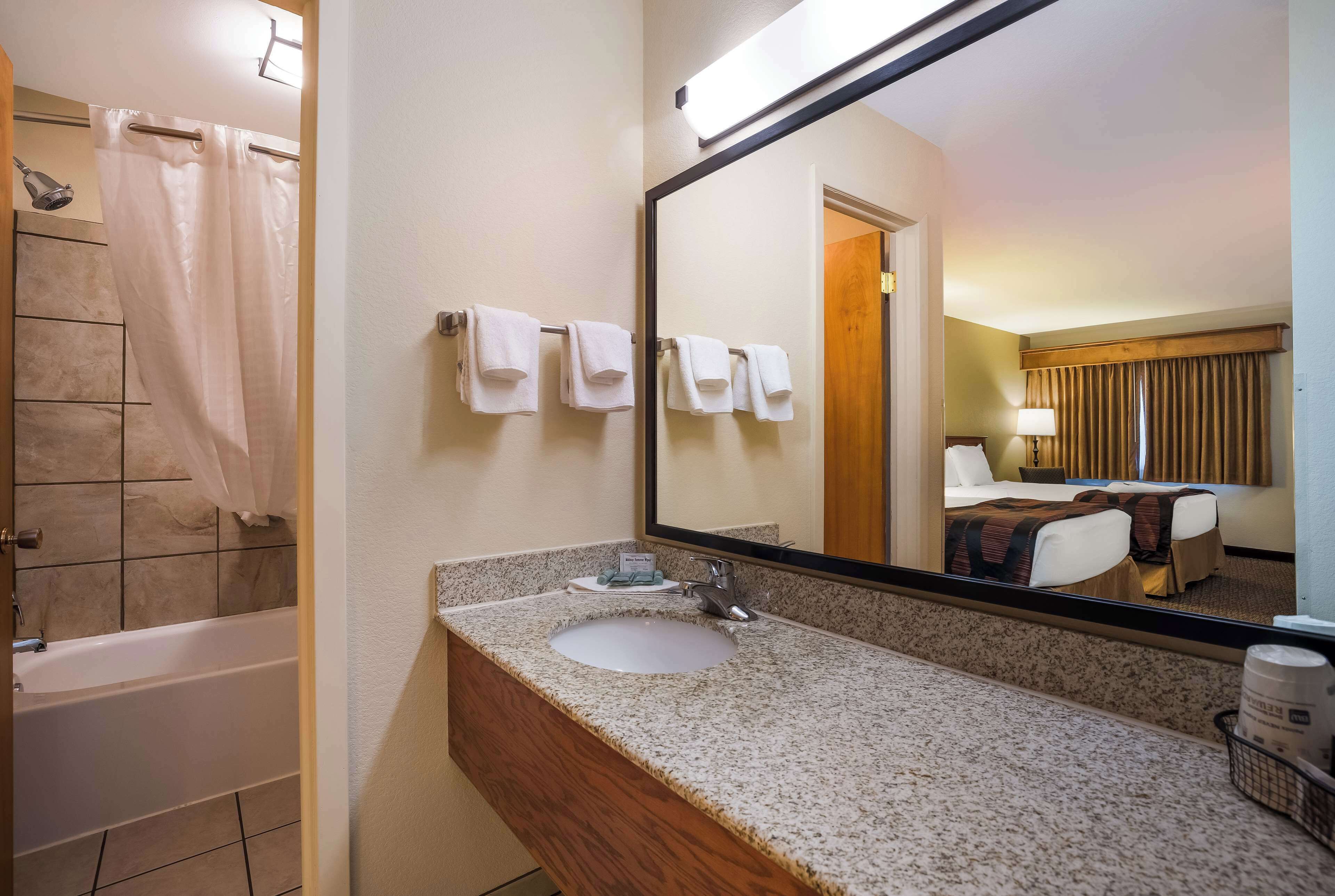 eco-friendly toiletries, hair dryer, towels