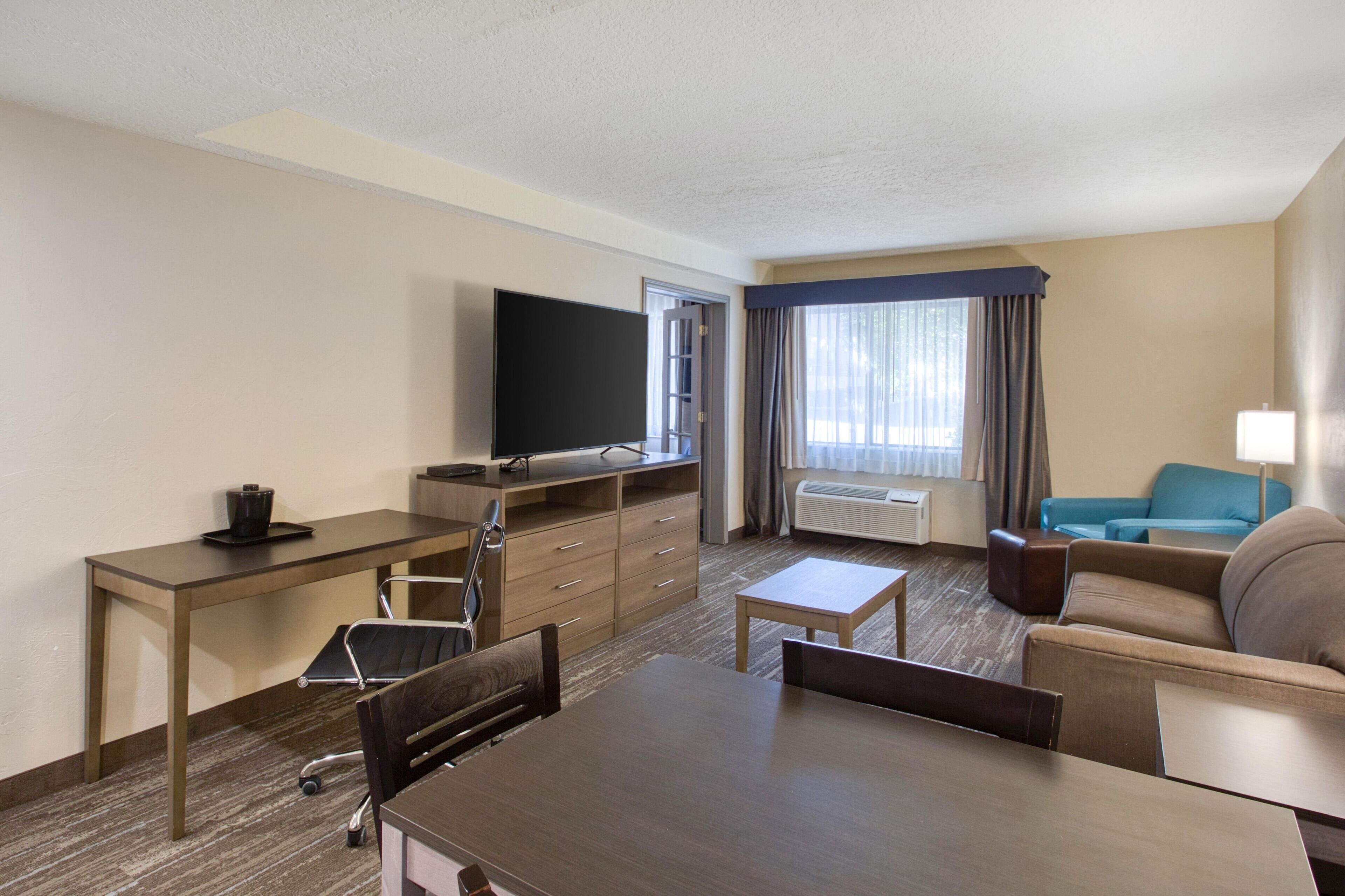 Suite, 2 Queen Beds, Non Smoking, Kitchenette (with Sofabed) | In-room safe, desk, laptop workspace, blackout curtains