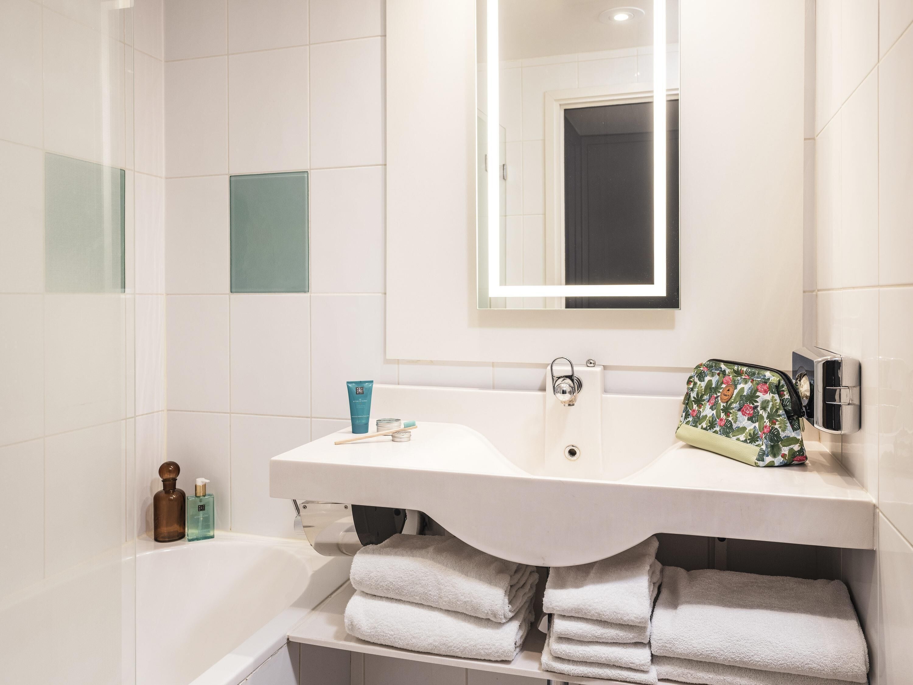 Eco-friendly toiletries, hair dryer, towels, soap