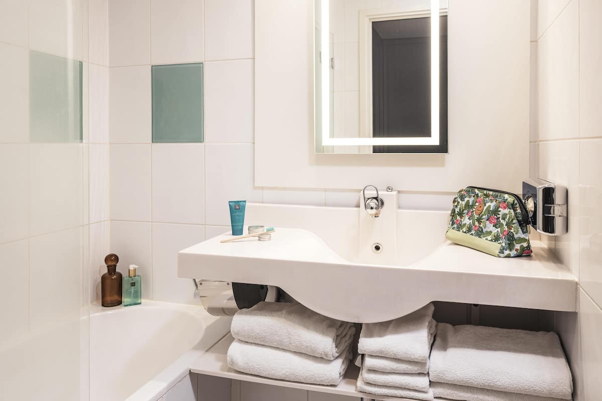 Eco-friendly toiletries, hair dryer, towels, soap