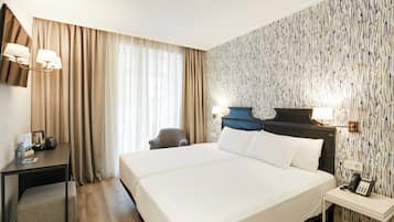 Klassieke Twin kamer | Een minibar, een kluis op de kamer, verduisterende gordijnen
