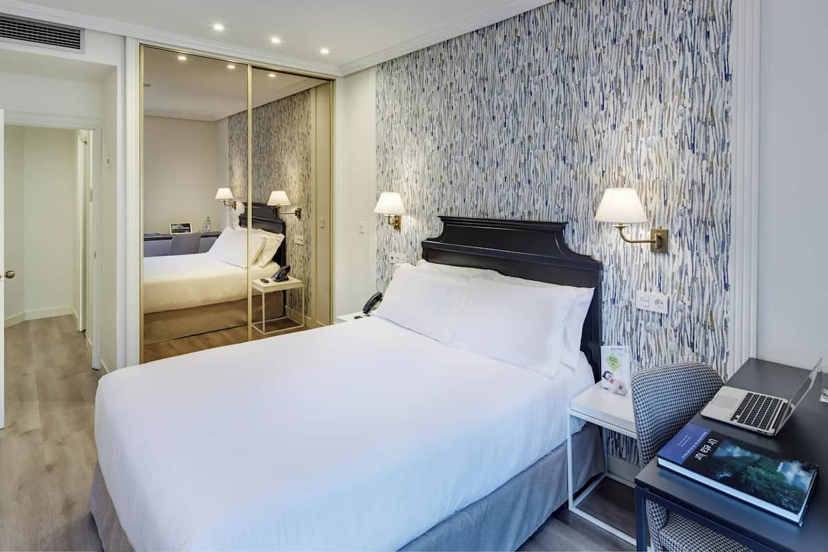 Classic Double Room | Minibar, in-room safe, blackout curtains, soundproofing