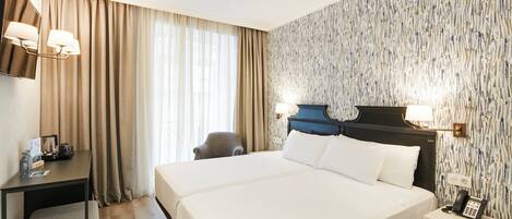 Classic Twin Room | Minibar, in-room safe, blackout curtains, soundproofing