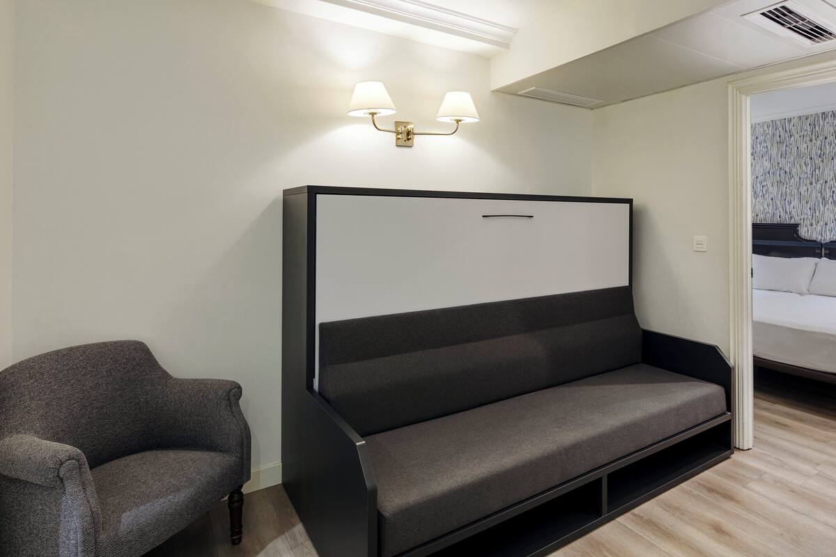 Family Triple Room | Minibar, in-room safe, blackout drapes, soundproofing