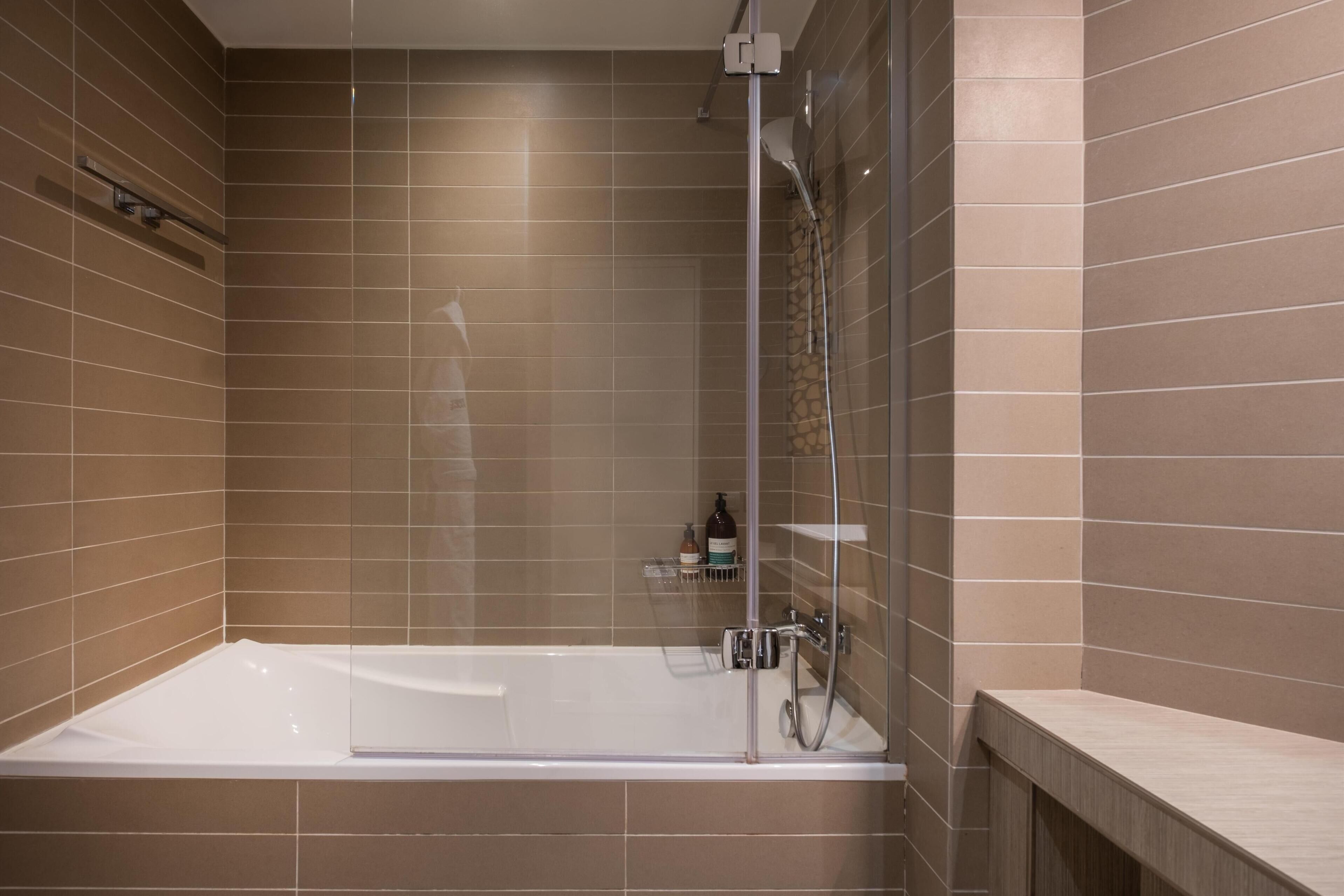 Designer toiletries, hair dryer, bathrobes, towels