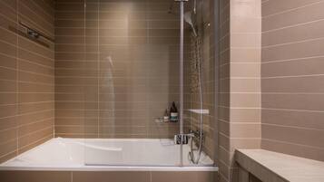 Designer toiletries, hair dryer, bathrobes, towels