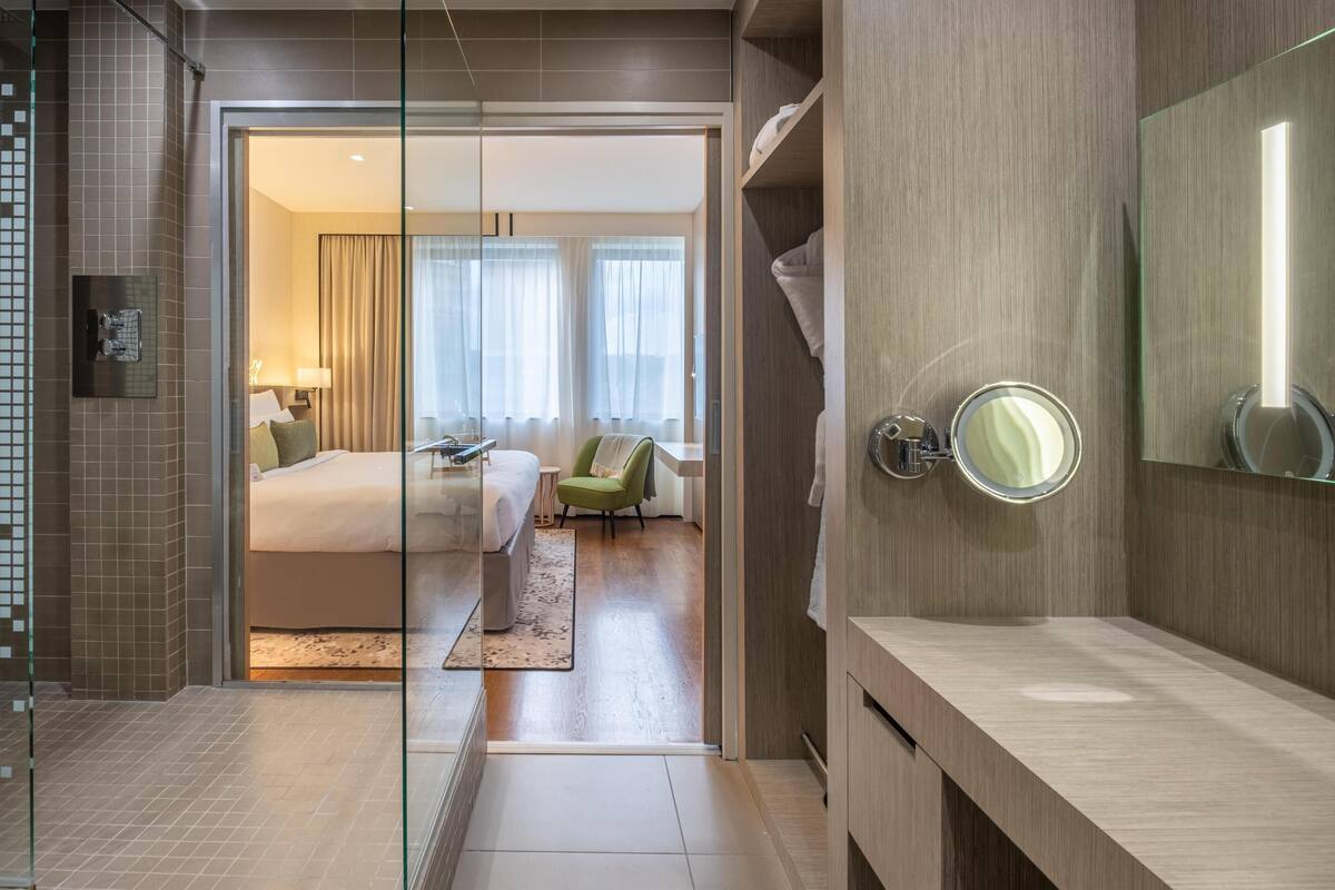 designer toiletries, hair dryer, bathrobes, towels