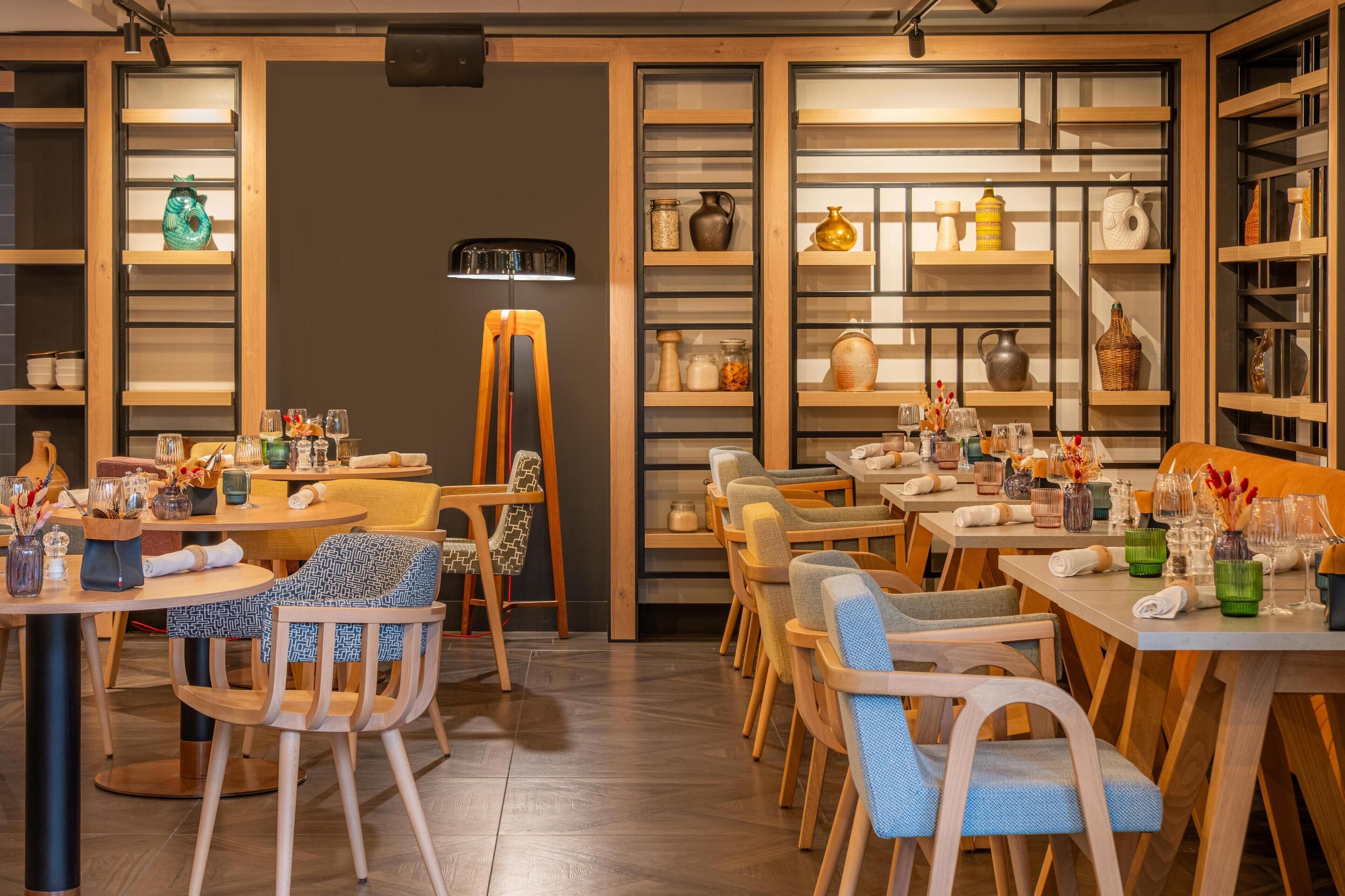 2 restaurants, breakfast, lunch, dinner served; local cuisine