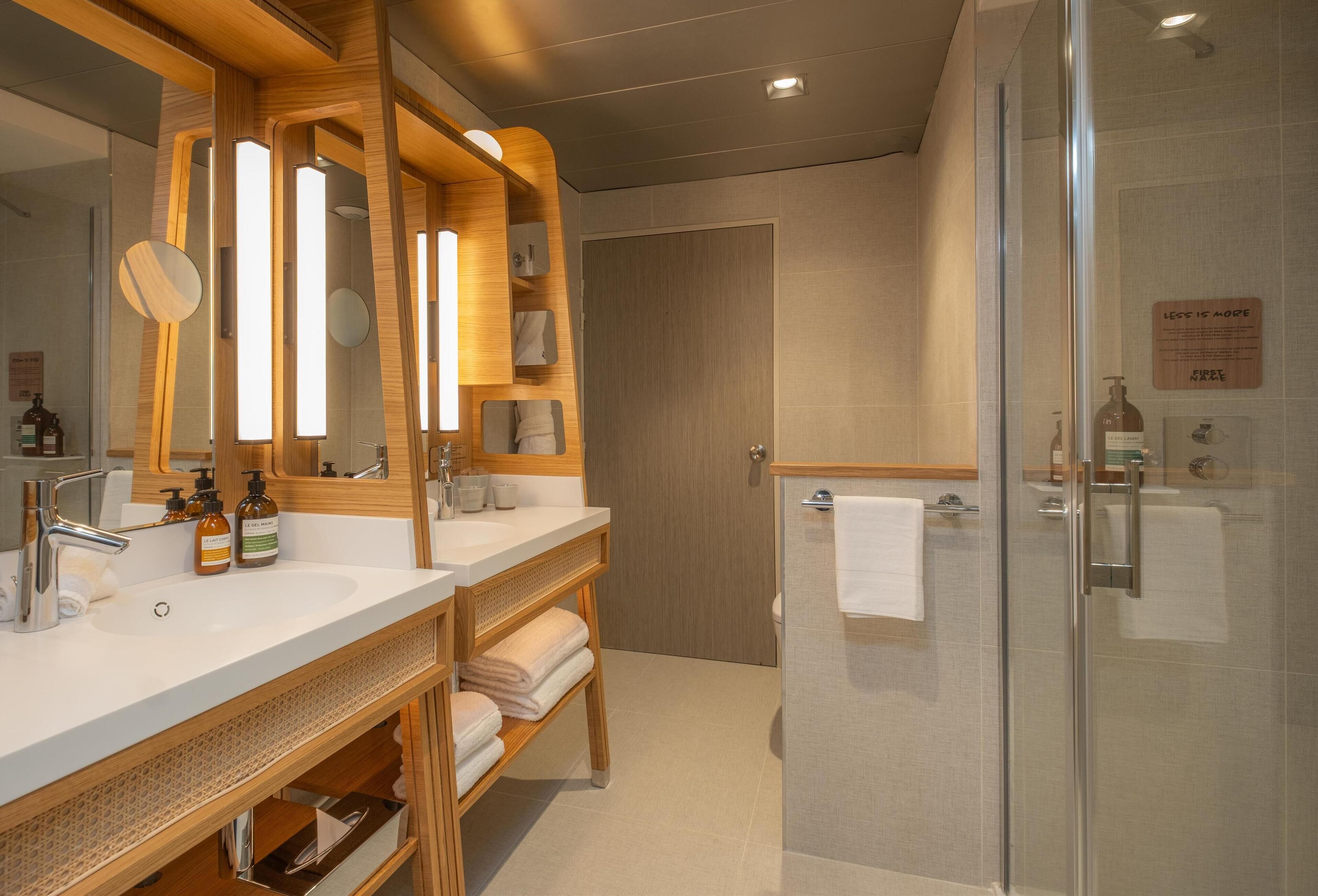 Designer toiletries, hair dryer, bathrobes, towels