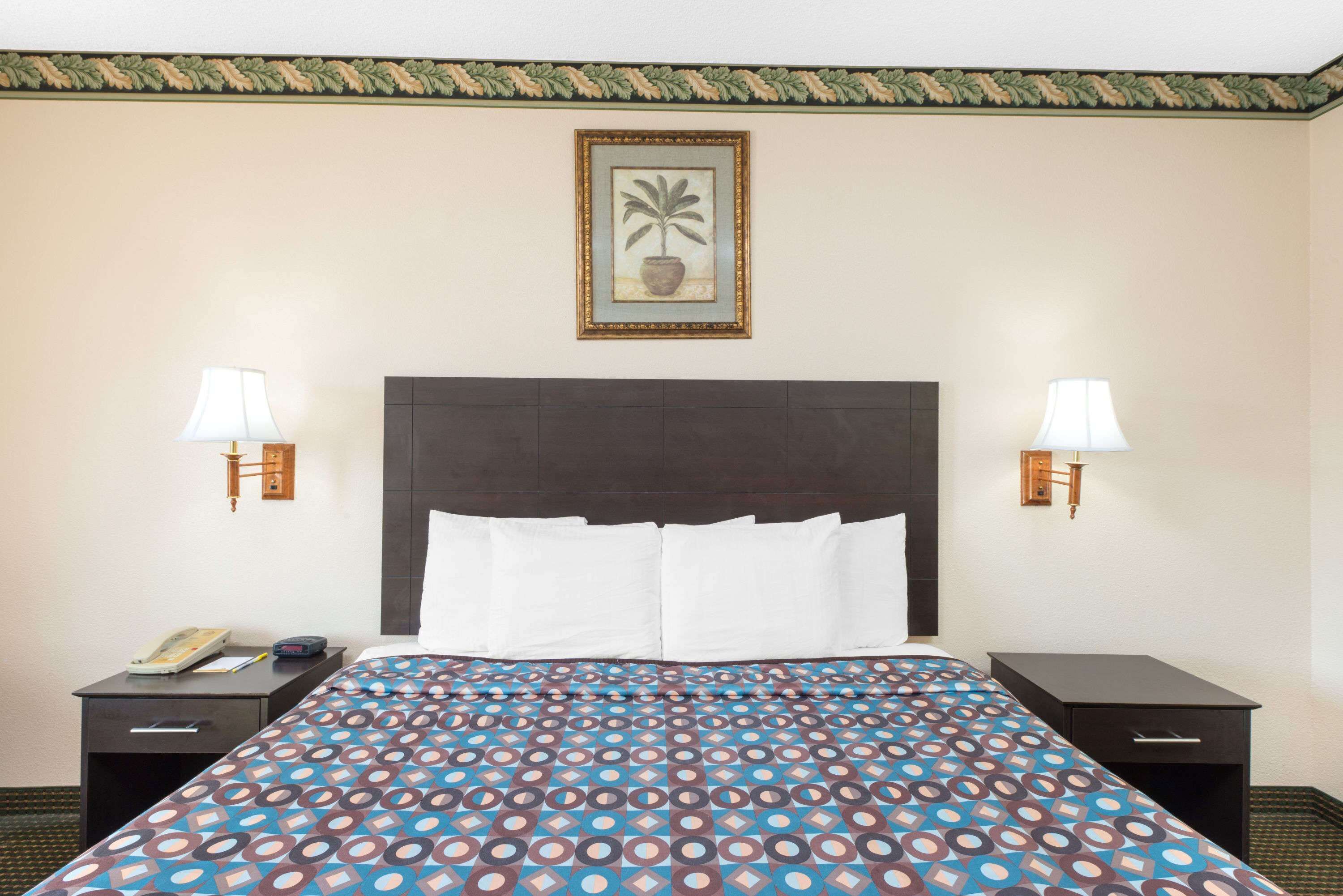 Desk, blackout drapes, iron/ironing board, free cribs/infant beds