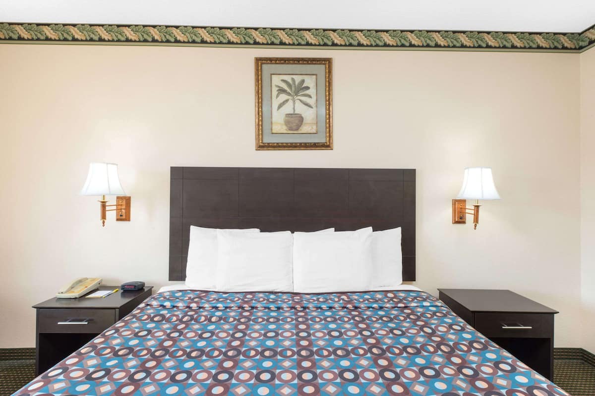 Desk, blackout drapes, iron/ironing board, free cribs/infant beds