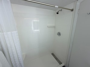 Economy Room, 1 Queen Bed, Non Smoking | Bathroom | Shower, free toiletries, hair dryer, towels