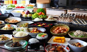 A variety of dishes and food items displayed on a table, including rice, vegetables, and seafood. - AoAwo Naruto Resort (Naruto)