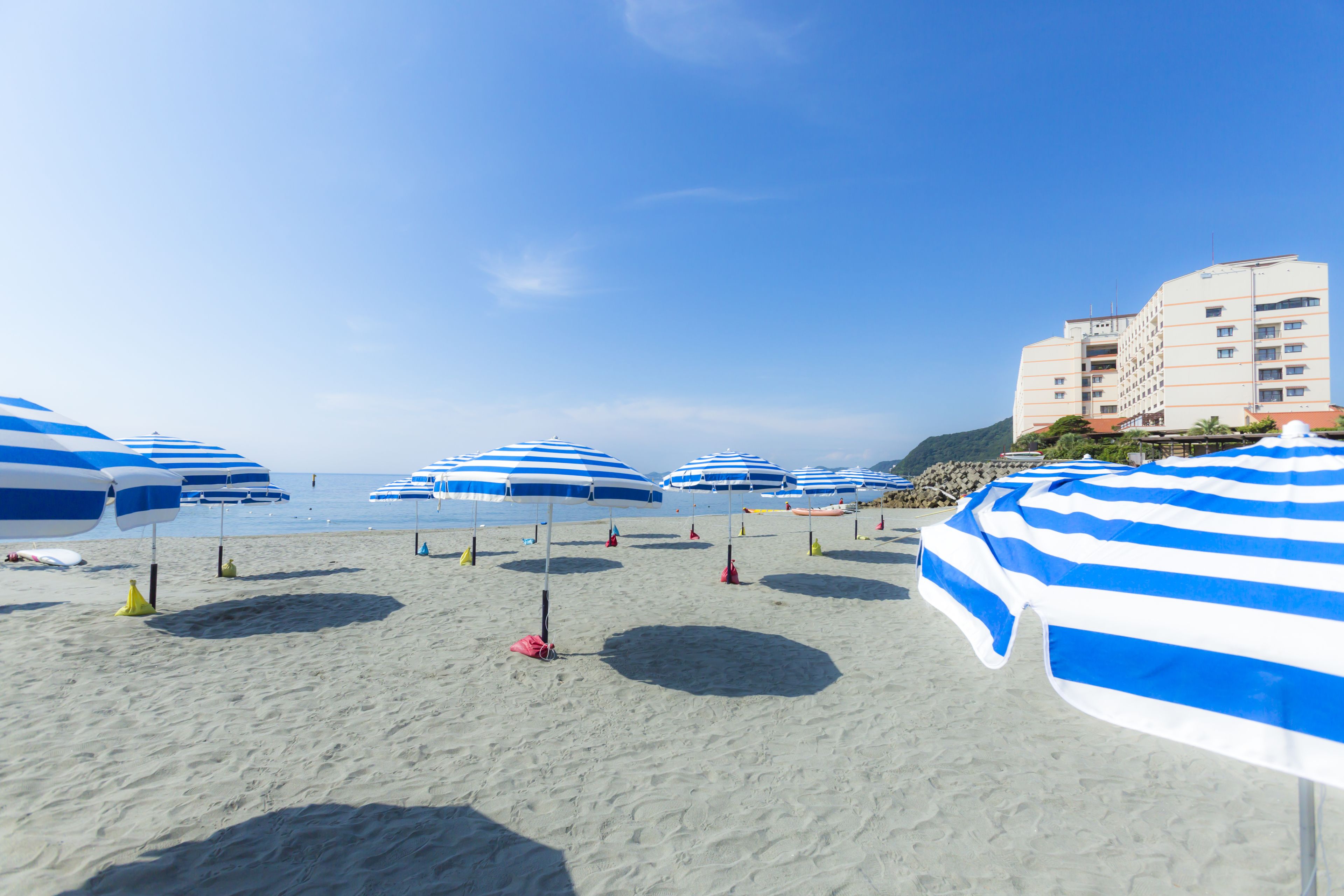 Private beach, beach umbrellas