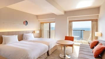 Chambre Premium avec lits jumeaux, non-fumeurs, vue océan | Literie de qualité supérieure, coffres-forts dans les chambres