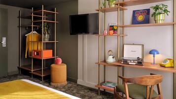 37-inch flat-screen TV with satellite channels, TV, books