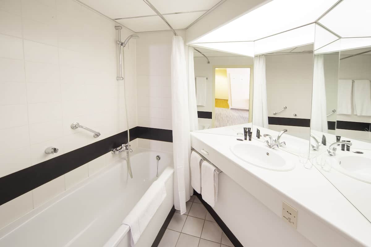 eco-friendly toiletries, hair dryer, towels