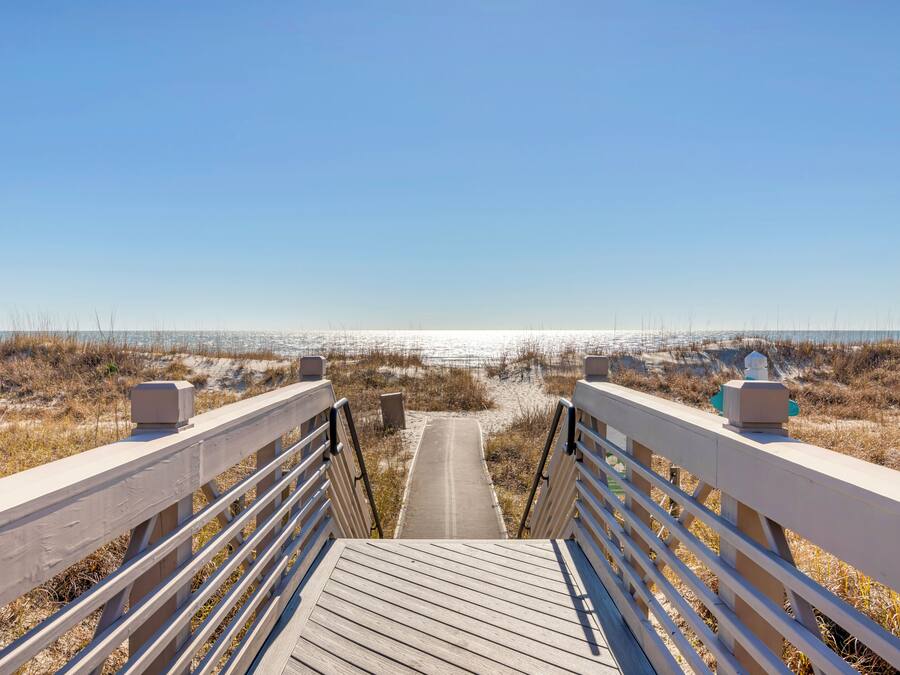 On the beach, white sand, sun-loungers, beach umbrellas
