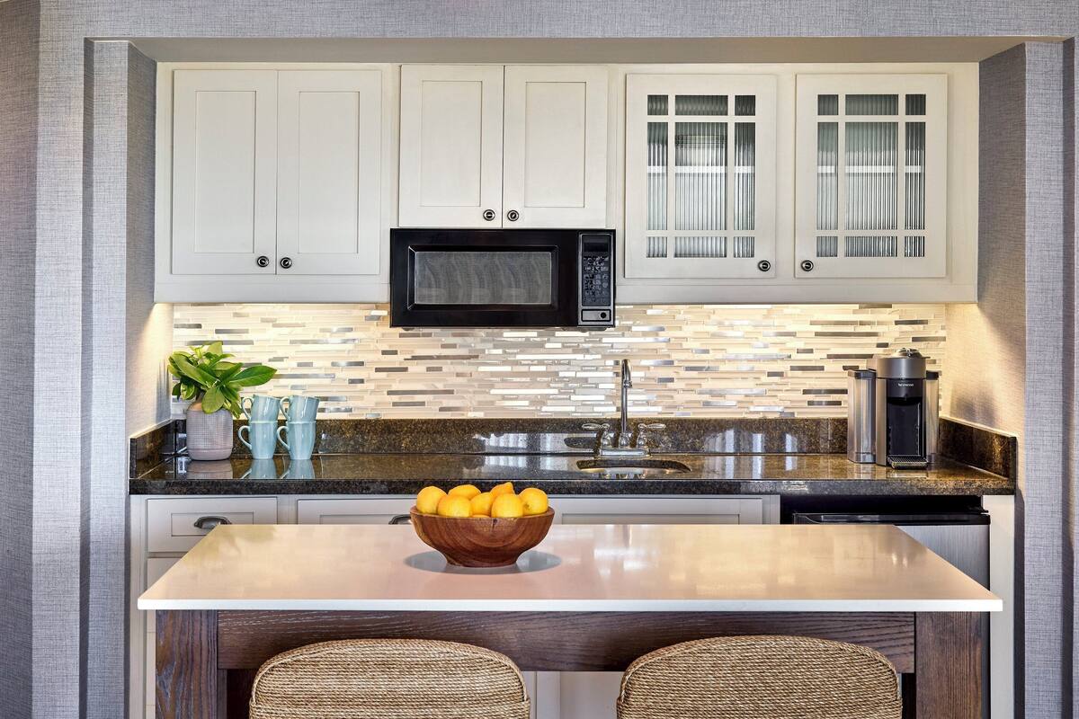 fridge, microwave, coffee/tea maker, cookware/dishes/utensils