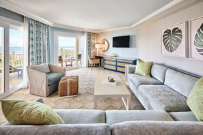 Luxury Suite, 1 King Bed, Oceanfront | Living room | 49-inch flat-screen TV with cable channels, Smart TV, pay movies
