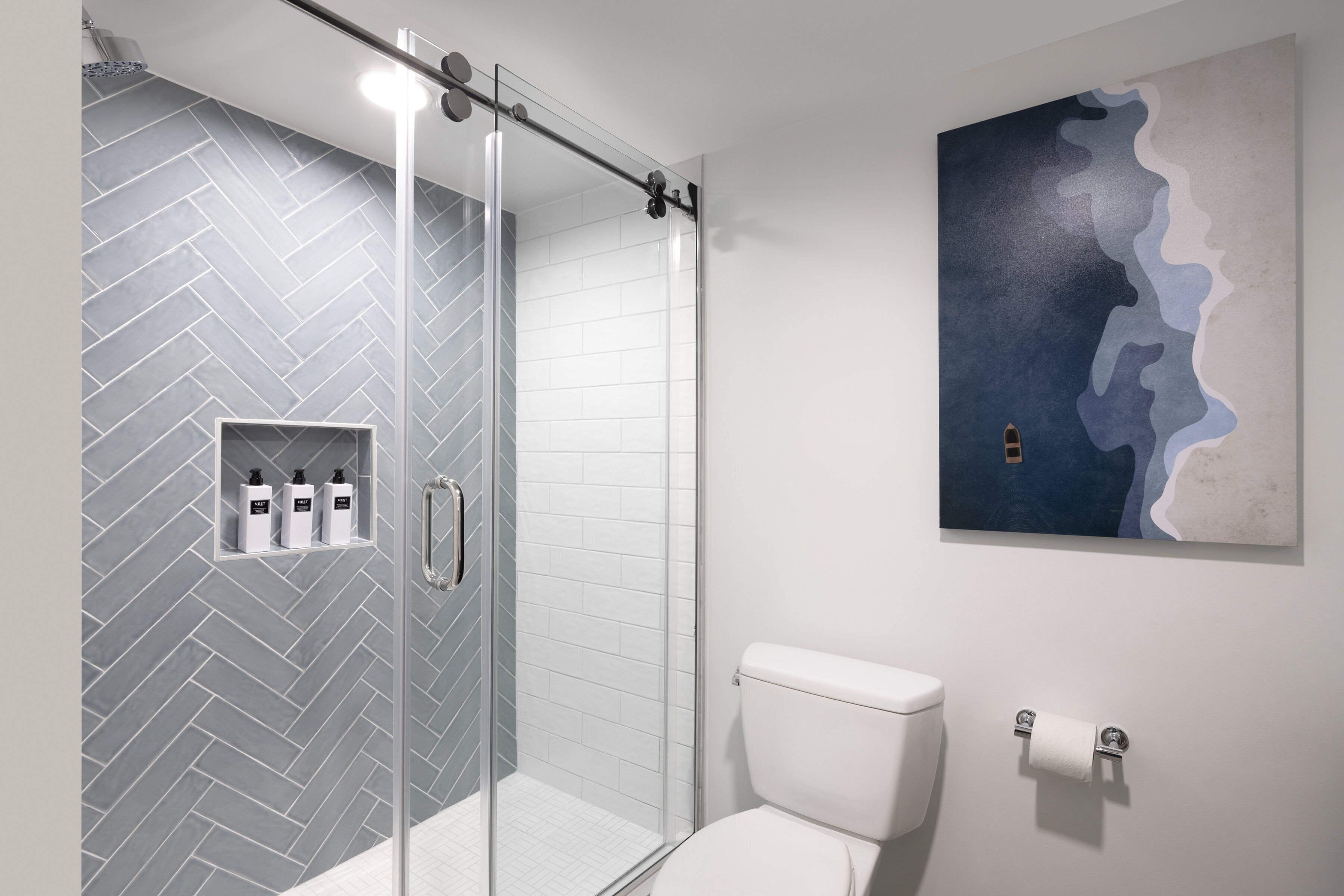 Designer toiletries, hair dryer, bathrobes, towels