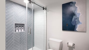 Designer toiletries, hair dryer, bathrobes, towels