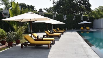 Outdoor pool, open 8:00 AM to 6:00 PM, pool umbrellas, sun loungers