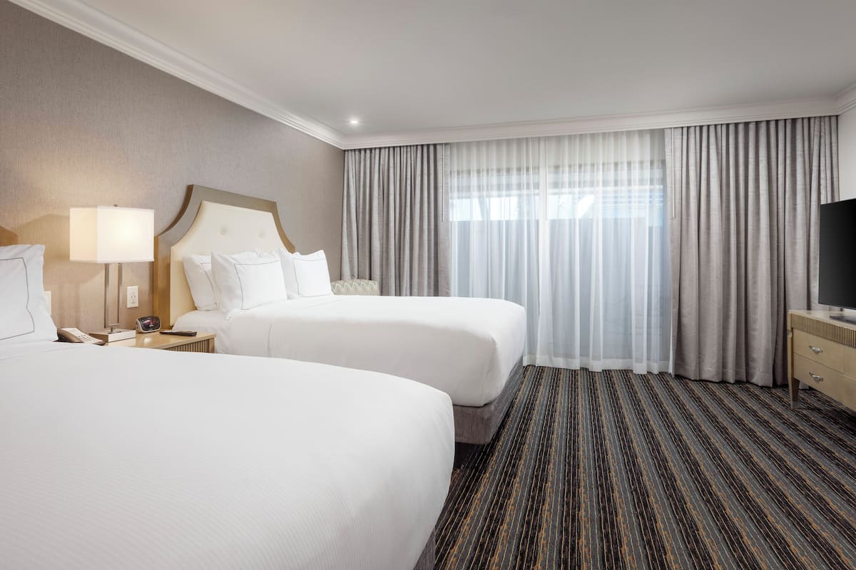 Junior Suite, 2 Queen Beds | In-room safe, desk, blackout drapes, iron/ironing board