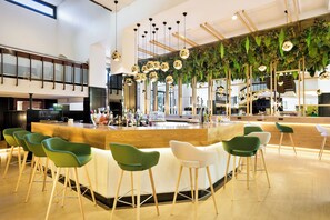 Breakfast, lunch, dinner served; local and international cuisine 