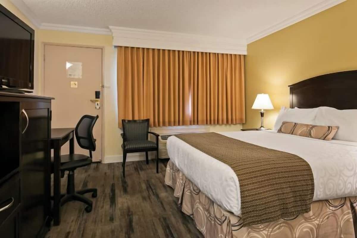 In-room safe, desk, laptop workspace, blackout curtains