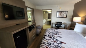 Desk, laptop workspace, blackout curtains, iron/ironing board