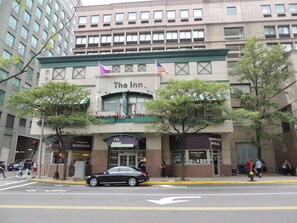 A hotel with a prominent sign reading "The Inn." - The Inn at Longwood Medical (Boston)