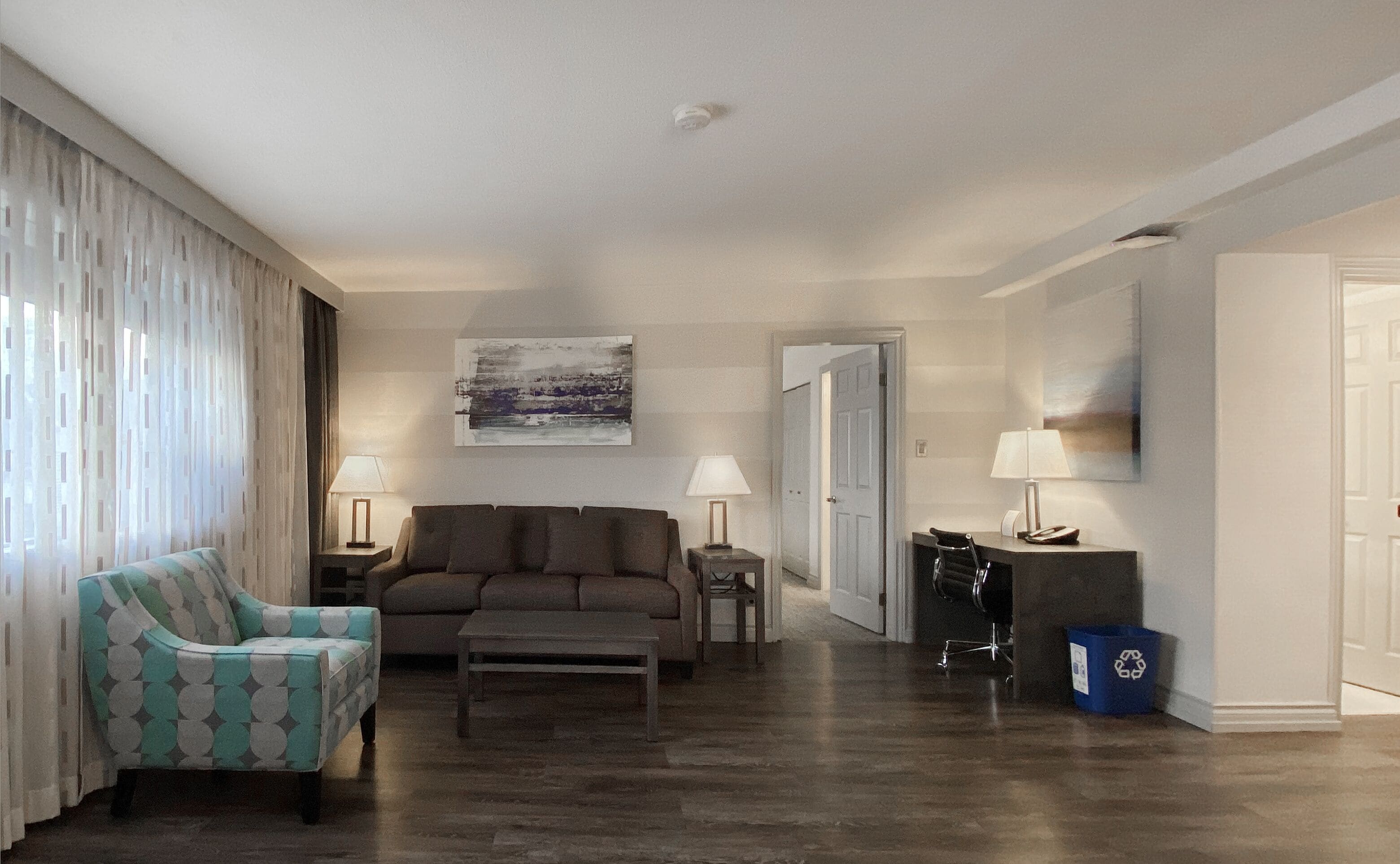 suite, 1 king bed, non smoking, kitchen (separate living room;with sofabed) | 1 bedroom, in-room safe, individually furnished, desk