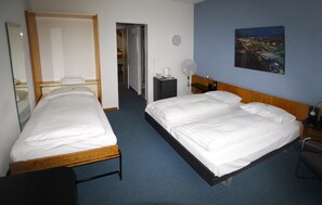 Ropa de cama hipoalergénica, minibar, caja fuerte