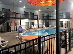 Indoor pool, open 8 AM to 10 PM, pool umbrellas