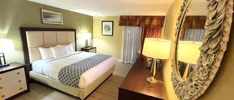 Desk, laptop workspace, blackout curtains, iron/ironing board