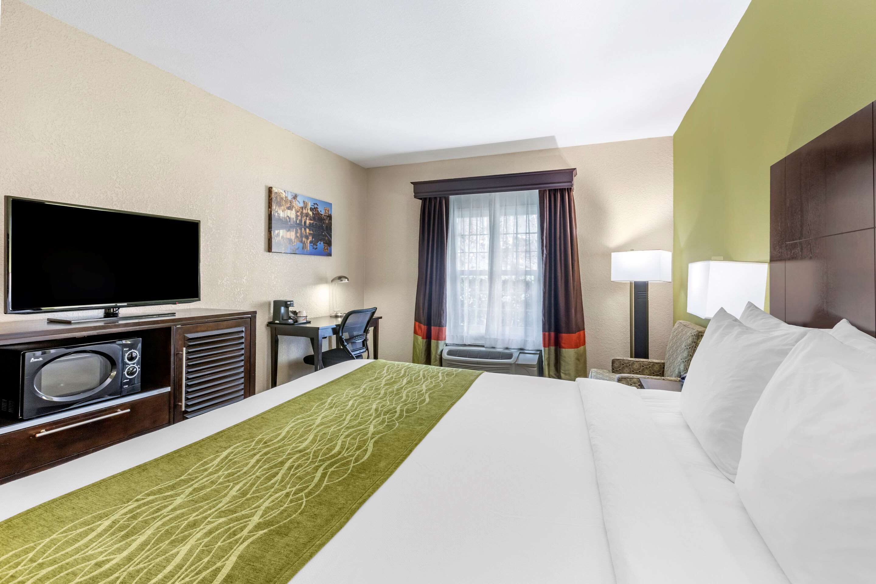 premium bedding, pillow-top beds, laptop workspace, blackout curtains